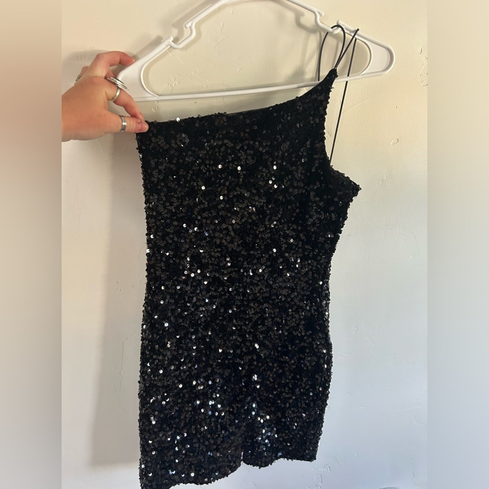 Midnight Doll, Black bedazzled one strap dress with slit.